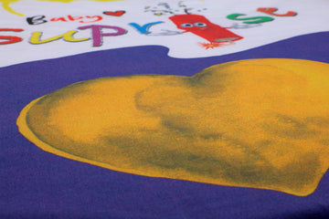 Detailansicht des goldenen Herzmotiv auf dem Baby♡Suprise® Dream Amora Soul Schlafsack